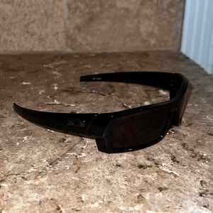 Oakley Sunglasses. Black. 55-16.